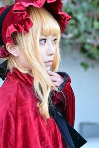 Rating: Safe Score: 0 Tags: 1girl bangs blonde_hair blue_eyes blurry blurry_background bonnet closed_mouth depth_of_field eyelashes flower lips long_hair profile realistic red_flower red_rose rose shinku solo upper_body User: admin