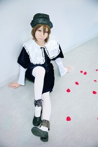 Rating: Safe Score: 0 Tags: 1girl black_footwear blonde_hair capelet dress hat lips long_sleeves looking_at_viewer petals shoes short_hair sitting solo souseiseki white_legwear User: admin