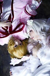 Rating: Safe Score: 0 Tags: 2girls blonde_hair blue_eyes dress eyelashes fingernails flower hair_ornament lips long_hair lying multiple_cosplay multiple_girls nail_polish realistic ribbon short_hair tagme User: admin