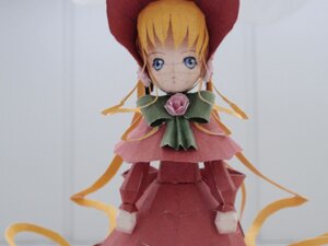 Rating: Safe Score: 0 Tags: 1girl blonde_hair blue_eyes bonnet bow bowtie capelet doll dress expressionless flower green_bow green_neckwear hat long_hair long_sleeves looking_at_viewer photo red_dress rose shinku simple_background solo twintails upper_body User: admin