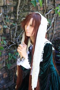 Rating: Safe Score: 0 Tags: 1girl black_dress blurry brick_wall brown_hair closed_mouth depth_of_field dress green_eyes long_hair long_sleeves outdoors plant solo suiseiseki User: admin