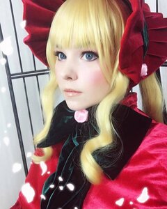 Rating: Safe Score: 0 Tags: 1girl bangs blonde_hair blue_eyes bow hair_bow lips lollipop long_hair looking_at_viewer nose shinku snowing solo umbrella upper_body User: admin