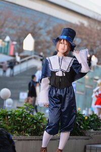 Rating: Safe Score: 0 Tags: blue_headwear blurry blurry_background blurry_foreground brown_hair depth_of_field hair_over_one_eye hat long_sleeves looking_at_viewer outdoors pants photo_background plant shirt short_hair solo souseiseki standing white_legwear User: admin