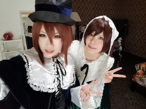 Rating: Safe Score: 0 Tags: 2girls brown_hair frills green_eyes hat heterochromia lips looking_at_viewer multiple_cosplay multiple_girls siblings sisters smile souseiseki suiseiseki tagme top_hat twins v User: admin