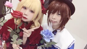 Rating: Safe Score: 0 Tags: 2girls blonde_hair brown_hair flower hat lips mini_hat multiple_cosplay multiple_girls realistic rose short_hair tagme top_hat User: admin