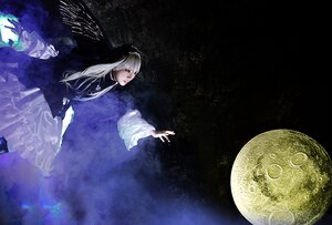 Rating: Safe Score: 0 Tags: 1girl dress frills from_side full_moon long_hair long_sleeves moon outstretched_arm outstretched_hand profile sky solo suigintou white_hair User: admin