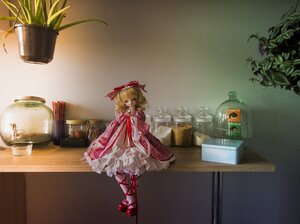 Rating: Safe Score: 0 Tags: 1girl blonde_hair doll dress flower_pot frills hat hinaichigo indoors lamp lantern plant potted_plant red_footwear solo standing vase window User: admin