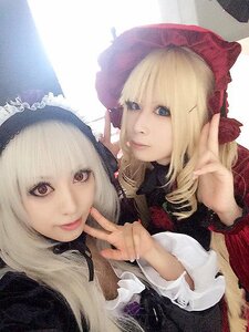 Rating: Safe Score: 0 Tags: 2girls blonde_hair blue_eyes bonnet bow drill_hair lips long_hair long_sleeves looking_at_viewer multiple_cosplay multiple_girls smile tagme v User: admin