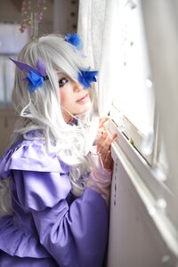 Rating: Safe Score: 0 Tags: 1girl barasuishou blurry butterfly_hair_ornament depth_of_field hair_ornament lips long_hair looking_at_viewer sitting solo white_hair User: admin