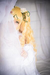 Rating: Safe Score: 0 Tags: 1girl blonde_hair blurry bride curtains depth_of_field dress flower green_eyes hair_flower hair_ornament kirakishou long_hair looking_at_viewer solo vertical_stripes white_dress white_flower white_rose User: admin