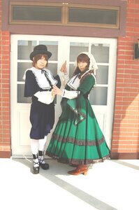 Rating: Safe Score: 0 Tags: 2girls black_footwear black_hair brown_hair dress green_dress hat holding_hands long_hair long_sleeves multiple_cosplay multiple_girls pantyhose shoes short_hair smile standing tagme white_legwear window User: admin