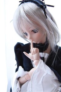 Rating: Safe Score: 0 Tags: 1girl bangs black_dress blue_eyes doll dress finger_to_mouth hair_ornament long_sleeves solo striped suigintou vertical_stripes white_hair User: admin