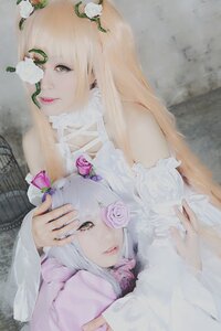 Rating: Safe Score: 0 Tags: 2girls bangs bare_shoulders blonde_hair flower hair_ornament lips long_hair looking_at_viewer multiple_cosplay multiple_girls pink_rose realistic rose tagme white_flower white_rose yellow_eyes User: admin