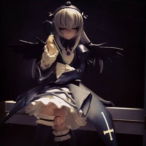 Rating: Safe Score: 0 Tags: 1girl black_background black_dress blonde_hair closed_eyes doll dress frills hairband long_hair long_sleeves ribbon solo standing suigintou wings User: admin