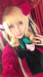 Rating: Safe Score: 0 Tags: 1girl animal_on_shoulder blonde_hair blue_eyes bow jewelry lips long_hair looking_at_viewer nail_polish realistic shinku solo User: admin