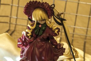 Rating: Safe Score: 0 Tags: 1girl blonde_hair bow doll dress drill_hair frills long_hair long_sleeves shinku solo User: admin