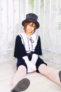 Rating: Safe Score: 0 Tags: between_legs black_headwear blonde_hair blue_eyes blurry curtains depth_of_field hat lips long_sleeves looking_at_viewer sitting solo souseiseki striped vertical_stripes User: admin