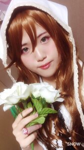Rating: Safe Score: 0 Tags: 1girl brown_hair closed_mouth flower green_eyes hair_between_eyes hood lips looking_at_viewer smile solo suiseiseki watermark User: admin