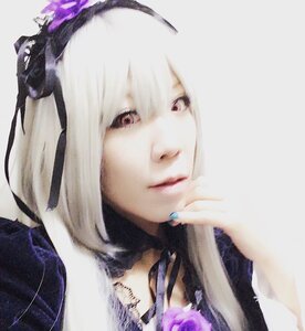 Rating: Safe Score: 0 Tags: 1girl bangs black_ribbon closed_mouth flower hair_flower hair_ornament hair_ribbon hairband lace looking_at_viewer nail_polish portrait purple_flower purple_rose ribbon rose simple_background solo suigintou white_background white_hair User: admin