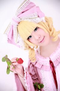Rating: Safe Score: 0 Tags: 1girl bangs blonde_hair blue_eyes earrings food frills fruit hat hinaichigo jewelry lips lolita_fashion ribbon smile solo strawberry User: admin