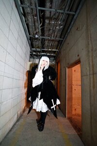 Rating: Safe Score: 0 Tags: 1girl black_dress black_footwear dress indoors solo standing suigintou tile_floor tiles wall white_hair User: admin