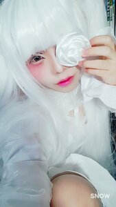 Rating: Safe Score: 0 Tags: 1girl artist_name closed_mouth cup hair_over_one_eye kirakishou lips looking_at_viewer solo sweater white_hair User: admin