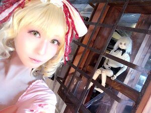 Rating: Safe Score: 0 Tags: 1girl blonde_hair bow doll hinaichigo lips shanghai_doll short_hair sitting solo traditional_media User: admin