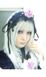 Rating: Safe Score: 0 Tags: 1girl bangs black_ribbon closed_mouth flower gothic_lolita hair_ribbon lips lolita_fashion long_hair looking_at_viewer purple_eyes realistic ribbon rose silver_hair solo suigintou User: admin