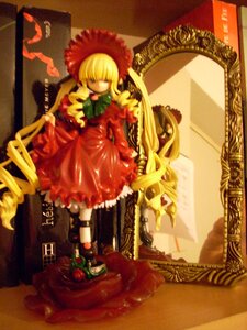 Rating: Safe Score: 0 Tags: 1girl blonde_hair bonnet bow bowtie doll dress flower long_hair long_sleeves red_dress rose shinku solo very_long_hair User: admin