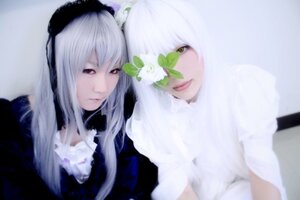 Rating: Safe Score: 0 Tags: 2girls blurry blurry_background blurry_foreground closed_mouth depth_of_field dress flower frills hairband lips long_hair looking_at_viewer multiple_cosplay multiple_girls red_eyes silver_hair smile suigintou tagme upper_body white_hair User: admin