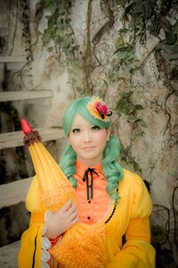 Rating: Safe Score: 0 Tags: 1girl closed_umbrella dress drill_hair flower hair_flower hair_ornament juliet_sleeves kanaria lips long_hair long_sleeves puffy_sleeves ribbon solo yellow_dress User: admin
