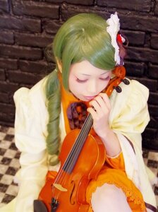 Rating: Safe Score: 0 Tags: 1girl acoustic_guitar closed_eyes green_hair guitar hair_ornament holding_instrument instrument kanaria long_sleeves lute_(instrument) music playing_instrument sitting solo violin User: admin