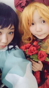 Rating: Safe Score: 0 Tags: 2girls blonde_hair blue_eyes bouquet flower hat lips multiple_girls red_flower red_rose rose shinku smile solo white_rose User: admin