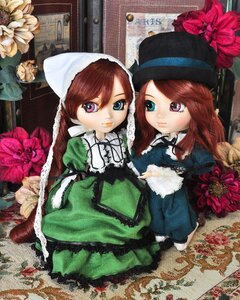 Rating: Safe Score: 0 Tags: 2girls brown_hair doll dress flower green_dress hat heterochromia long_hair long_sleeves looking_at_viewer multiple_dolls multiple_girls red_eyes siblings sisters smile souseiseki suiseiseki tagme top_hat twins User: admin