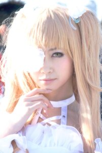 Rating: Safe Score: 0 Tags: 1girl bangs blonde_hair blurry choker eyelashes eyepatch green_eyes hair_ornament kirakishou lips long_hair looking_at_viewer ribbon smile solo User: admin