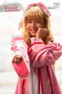 Rating: Safe Score: 0 Tags: 1girl artist_name blonde_hair blurry depth_of_field dress food hinaichigo incoming_gift long_hair realistic ribbon smile solo teeth User: admin