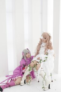 Rating: Safe Score: 0 Tags: 2girls blonde_hair blue_eyes boots dress flower green_eyes hair_ornament long_hair multiple_cosplay multiple_girls sitting striped striped_legwear tagme thighhighs vertical_stripes User: admin