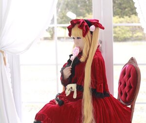 Rating: Safe Score: 0 Tags: 1girl blonde_hair blue_eyes blurry candy depth_of_field dress food holding lolita_fashion lollipop long_hair long_sleeves red_dress shinku sitting solo stuffed_animal very_long_hair User: admin