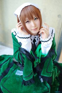 Rating: Safe Score: 0 Tags: 1girl artist_name bangs blurry blurry_background blurry_foreground brown_hair closed_mouth depth_of_field dress green_dress lips long_sleeves looking_at_viewer photo realistic signature smile solo suiseiseki User: admin