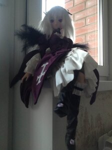 Rating: Safe Score: 0 Tags: 1girl black_legwear boots doll dress frills long_hair long_sleeves solo standing suigintou User: admin