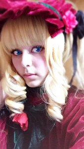 Rating: Safe Score: 0 Tags: 1girl bangs blonde_hair blue_eyes blurry bow closed_mouth depth_of_field drill_hair eyelashes flower hair_flower lips looking_at_viewer portrait realistic ribbon rose shinku solo User: admin