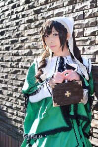Rating: Safe Score: 0 Tags: 1girl black_eyes black_hair dress frills holding lips long_sleeves solo suiseiseki User: admin