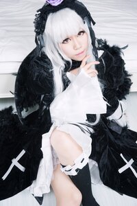 Rating: Safe Score: 0 Tags: 1girl bangs black_legwear closed_mouth dress lips long_hair looking_at_viewer sitting solo striped suigintou thighhighs white_hair User: admin