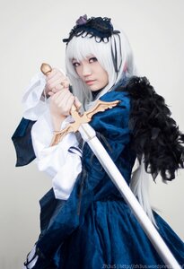 Rating: Safe Score: 0 Tags: 1girl blurry closed_mouth dress hairband holding holding_sword holding_weapon lips long_sleeves looking_at_viewer solo standing suigintou sword weapon white_hair User: admin