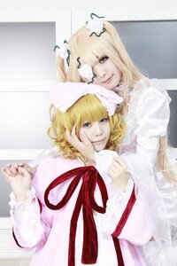 Rating: Safe Score: 0 Tags: 2girls bangs blonde_hair dress eyepatch flower frills lips long_hair looking_at_viewer multiple_cosplay multiple_girls ribbon rose short_hair smile striped tagme User: admin