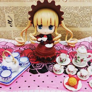 Rating: Safe Score: 0 Tags: 1girl blonde_hair blue_eyes bonnet bow cup doll dress flower food hat long_hair long_sleeves pink_flower pink_rose red_dress rose saucer shinku solo tea teacup teapot User: admin