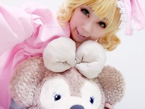 Rating: Safe Score: 0 Tags: 1girl bangs blonde_hair blunt_bangs green_eyes hat hinaichigo lips looking_at_viewer mittens short_hair sleeves_past_wrists smile solo striped User: admin