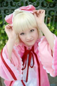 Rating: Safe Score: 0 Tags: 1girl bangs blonde_hair blurry blurry_background blurry_foreground bow depth_of_field dress hinaichigo lips looking_at_viewer neck_ribbon nose realistic red_ribbon ribbon smile solo upper_body User: admin