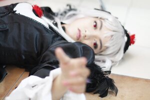 Rating: Safe Score: 0 Tags: 1girl aiming blurry blurry_background blurry_foreground closed_mouth depth_of_field flower foreshortening gun holding_weapon lips looking_at_viewer maid_headdress motion_blur photo red_eyes rose solo suigintou weapon white_hair User: admin