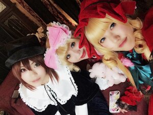 Rating: Safe Score: 0 Tags: 91076 blonde_hair blue_eyes dress drill_hair flower hat lips multiple_cosplay multiple_girls realistic rose tagme User: admin